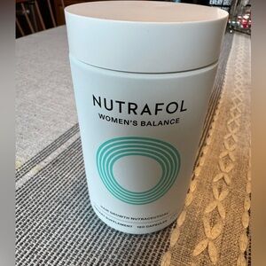 ALMOST FULL BOTTLE OF NUTRAFOL WOMENS.